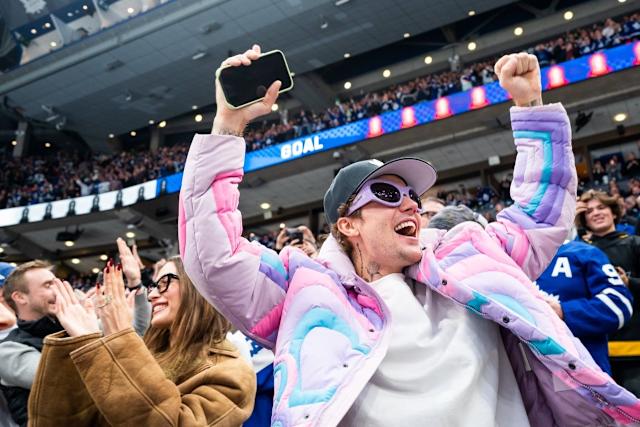 Hailey And Justin Bieber Cheering During An NHL Playoff Game